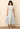 Elegant Draped Blouse and Flowing Paneled Midi Skirt Set